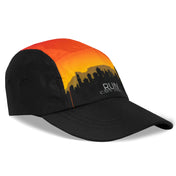 Angled front view of Headsweats Run The World Cape Town 2026 performance running hat with city skyline graphic