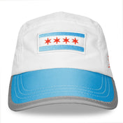 Front view of Run The World Chicago 2026 performance running hat with blue brim and city flag design