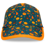 Front view of the Headsweats Turkey Trot Limited Edition Go Hat featuring teal background and Thanksgiving print with turkeys, pumpkins, and pies.